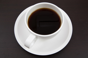 Cup of coffee and paper