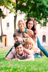 Fototapeta premium Group of happy smiling Teenage Students Outside
