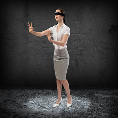 young blindfolded woman