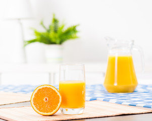 orange and a glass of orange juice