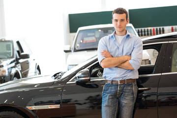 Fototapeta na wymiar man standing near a car
