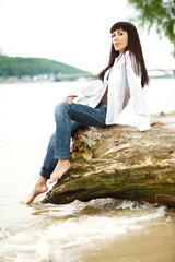 young female on a beam