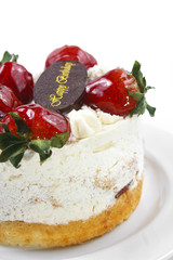 butter cream cake with strawberry & birthday chocolate plate