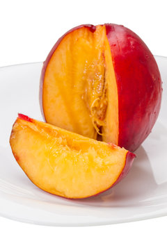 Nectarine on a white plate