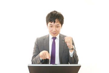 ガッツポーズのビジネスマン