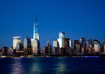 Fototapeta na wymiar The new Freedom Tower and Lower Manhattan Skyline At Night