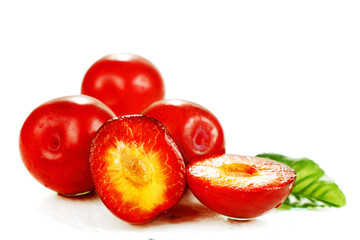 ripe red plums.