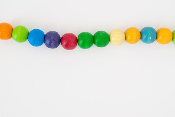 Background with colored wooden pearls