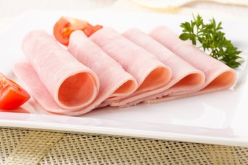 Cooked ham served on a plate