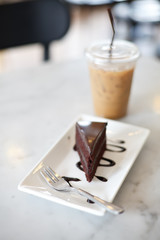 Iced coffee with blueberry cheese cake