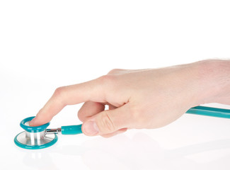 Hand holding a stethoscope isolated