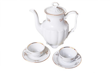 White porcelain teapot  and two cups- white background