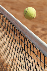 tennis ball over the net