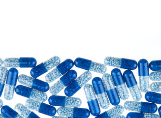 Blue pills isolated on white background