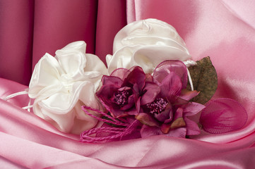  wedding rings on colorful fabric