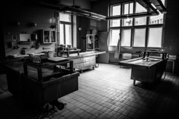 an autopsy room interior low light