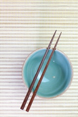 Fototapeta na wymiar Chopsticks and Asian table setting
