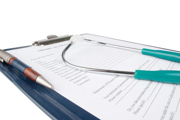 Stethoscope on medical document (medical questionnaire)