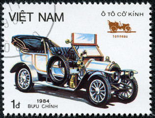Fototapeta na wymiar stamp printed by VIETNAM shows old car