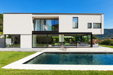 Modern villa with pool, view from the garden