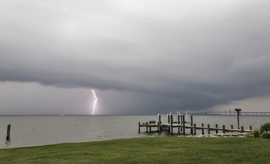 A bolt of lightening pierces the water in the Chesapeake Bay