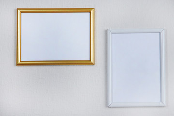 Photo frames on wall background