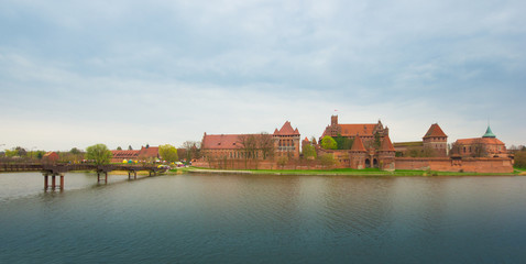 Teutonic castle Malbork in Pomerania region of Poland over Nogat