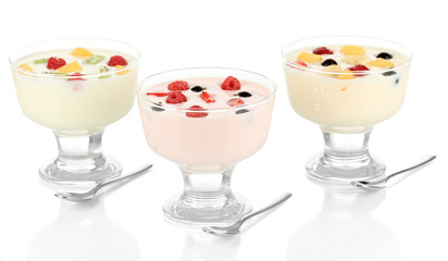 Delicious yogurt with fruit isolated on white