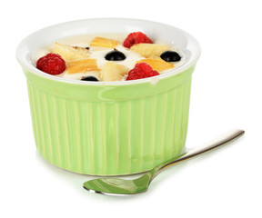 Delicious yogurt with fruit isolated on white