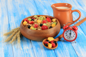 Oatmeal with fruits on table close-up