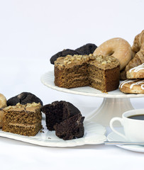 Continental breakfast buffet table setting with coffee and pastr