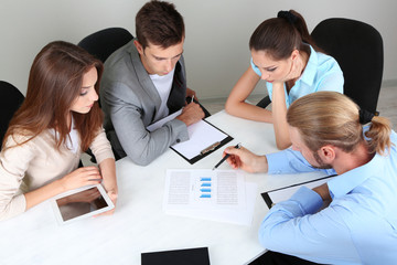 Fototapeta premium Business team working on their project together at office