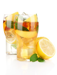 Iced tea with lemon and mint isolated on white
