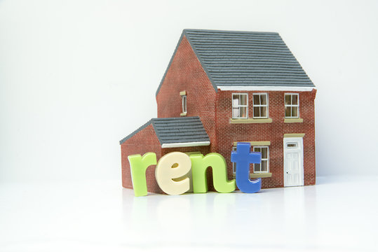 Rent lease house concept with model house and letters