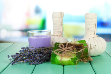 Obraz na płótnie Canvas Still life with lavender candle, soap, massage balls, soap and