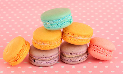 Gentle macaroons on pink background