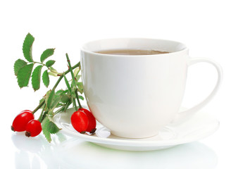 cup of tea with hip roses, isolated on white