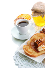 White bread toast with honey and cup of coffee, isolated