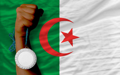 Silver medal for sport and  national flag of algeria