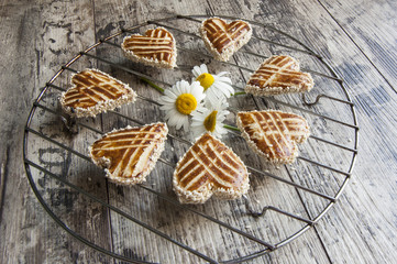 Cookies in the shape of heart on theold  table