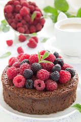 Chocolate mousse cake with raspberries.