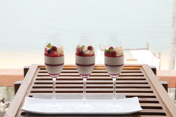 Delicious panna cotta dessert mixed berry .