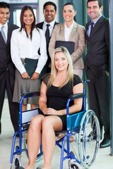 disabled young businesswoman and team