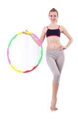 Woman doing exercises with hula hoop
