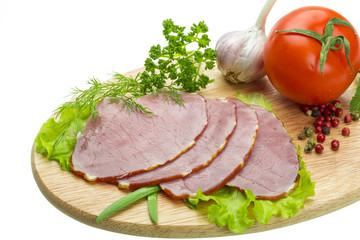 Ripe fresh ham with vegetables