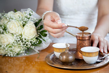 Bride preparing Turkish coffee
