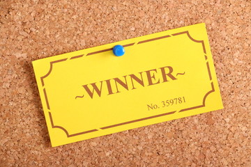 Winner Ticket on a cork notice board