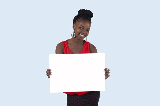 African girl holding a blank sign