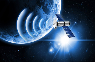 Naklejka premium planet earth and satellite in space