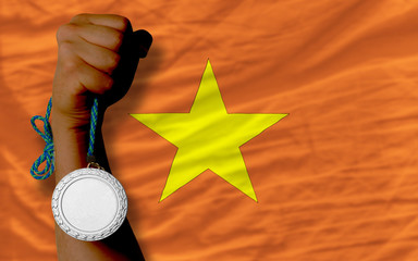 Silver medal for sport and  national flag of vietnam
